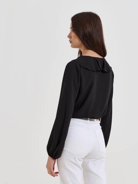 Blusa com folho Blusa com folho